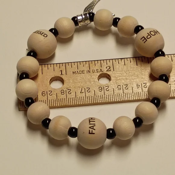Hand Crafted Natural Wood and Black Bead Bracelet with Silver Wing Charm - Picture 4 of 6